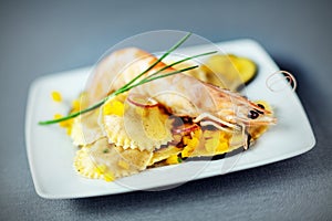 Seafood ravioli appetizer with shrimp photo