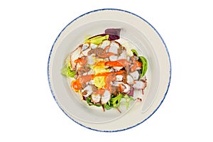 With seafood salad in plate on white isolated background