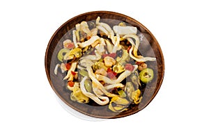 Seafood salad with shrimp, squid and mussels isolated on white