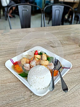 Seafood sapo tofu with rice photo