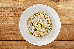 Seafood tagliatelli with salmon fillets photo