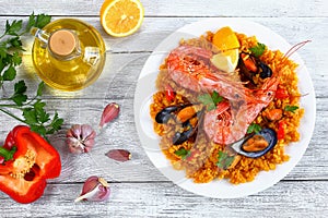 Seafood valencia paella on white plate