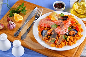 Seafood valencia paella on white plate