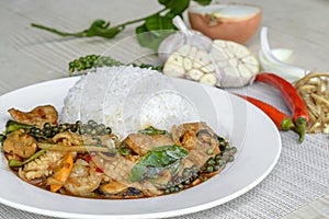 Seafoods cooked with thai spicy paste and thai harb
