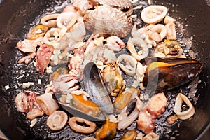 Seafoods on pan photo