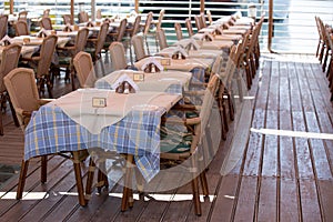 Seafront cafe tables rows