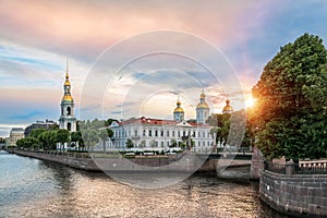 Seagull in the dawn of the colorful sky above the St. Nicholas Cathedral