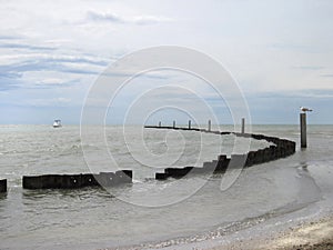 Seagull are sitting on the breakwater