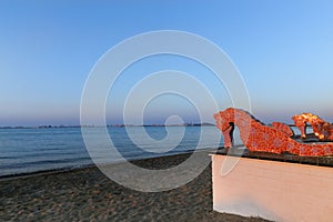 Seahorse sculpture on the beach on the Mar Menor in La Manga, Murcia, Spain photo