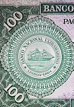 Seal of portuguese Banco National Ultramarino on Mozambique 100 Escudos currency banknote from 60s