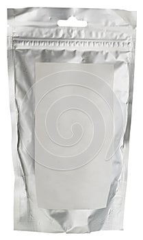 Sealed foil food package with blank white sticker isolated on white.