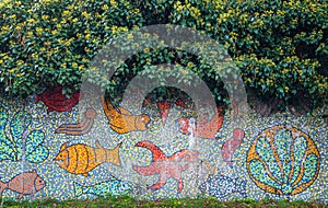 Sealife theme mosaic on the old abandoned urban wall