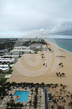 Sealine and sand beach with pool in Fort Lauderdale, USA