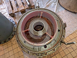 Sealing flange with housing for bearing in axial propeller pump