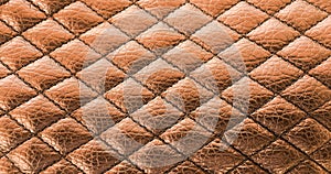 Seam black leather texture background. Organic leather background. Black natural leather texture.