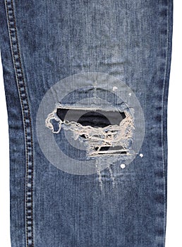 Seam blue denim cotton ripped jeans fabric texture background