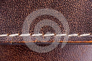 Seam on leather briefcase