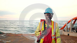 Seaman AB or Bosun on deck of vessel or ship