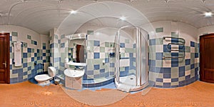 Seamless 360 panorama in interior of  bathroom of cheap hotel,  flat or apartments with washbasin and toilet bowlin