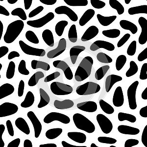 Seamless abstract pattern with black spots. Spotted background, fabric, textile, dalmatian print, cow pattern