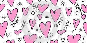 Seamless abstract pattern of different pink hearts and doodles. Freehand scribble background, texture