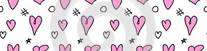 Seamless abstract pattern of different pink hearts and doodles. Freehand scribble background, texture