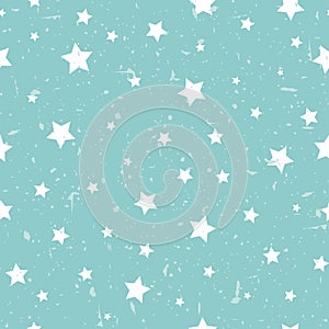Seamless abstract pattern with white stars of different rotation and size. Grunge star powder blue