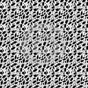 Seamless abstract spotted black ink blob repeating pattern texture