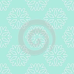 Seamless art pattern with snowflakes on blue