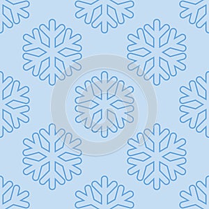Seamless art pattern with snowflakes on blue