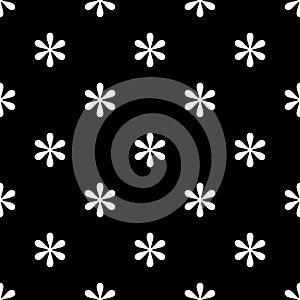 Seamless asterisk sign pattern on black