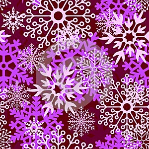 seamless asymmetric pattern of multicolored snowflakes on a purple background