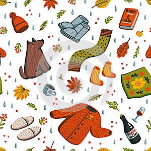 Seamless autumn pattern. Fall season essentials warm clothes, pillow, Porto, autumn berries and leaves, book, and cute