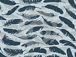 Seamless background with bird feathers.