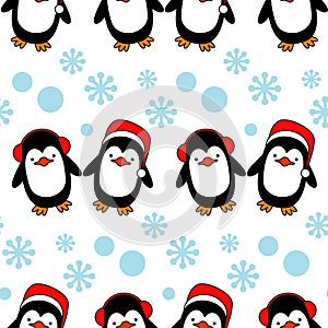 Seamless background with Christmas decorative penguins.