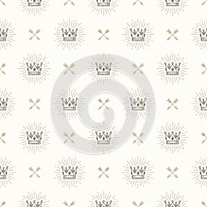 Seamless background with crowns and arrows photo