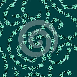 Seamless background of decorative abstract flowers in curved lines