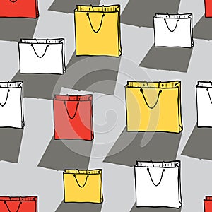 Seamless background of drawn colorful shopping bags with shadows