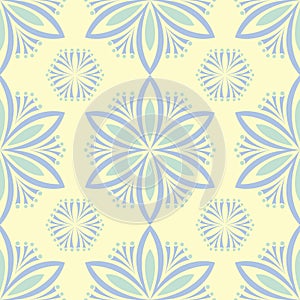 Seamless background with floral pattern. Beige background with light blue and green flower elements