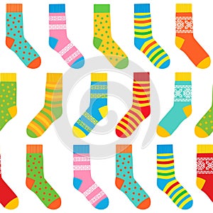 Seamless background of multi-colored socks with patterns and stripes