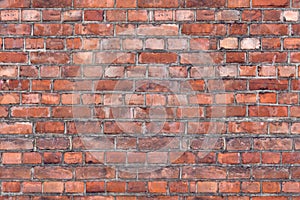 Old orange brick wall seamless background