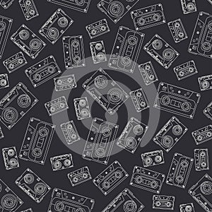 Seamless background pattern hipster style with audiocassette. Music. Sound. Retro. Magnetic tape. Analogue multimedia