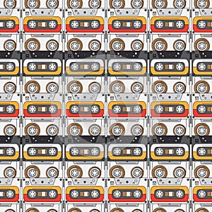 Seamless background pattern hipster style with audiocassette. Music. Sound. Retro. Magnetic tape. Analogue multimedia