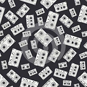 Seamless background pattern hipster style with audiocassette. Music. Sound. Retro. Magnetic tape. Analogue multimedia