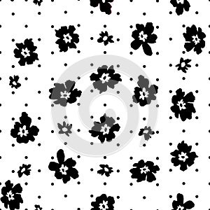 Seamless background with a primitive floral pattern and black and white polka dots. Simple minimalistic cute big flowers