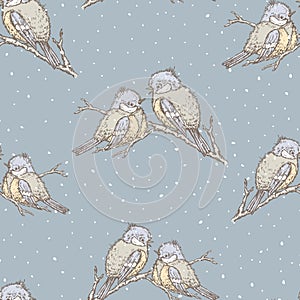 Seamless background of titmouses in winter
