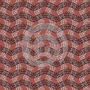 Seamless background with a zigzag pattern of leopard spots. Glitches.