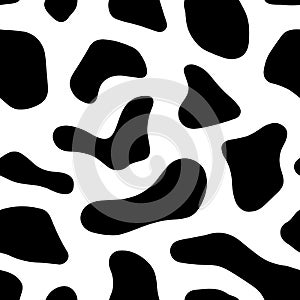 Seamless black cow spots pattern photo