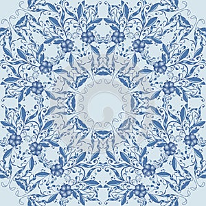 Seamless blue pattern with flowers and leaves made up of circular patterns.