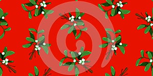 Seamless Christmas and New Year pattern with mistletoe branches with white berries and red ribbon on a festive red background photo